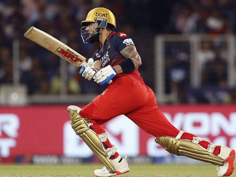 Kohli's ton powers defending champ Bengaluru to top of IPL